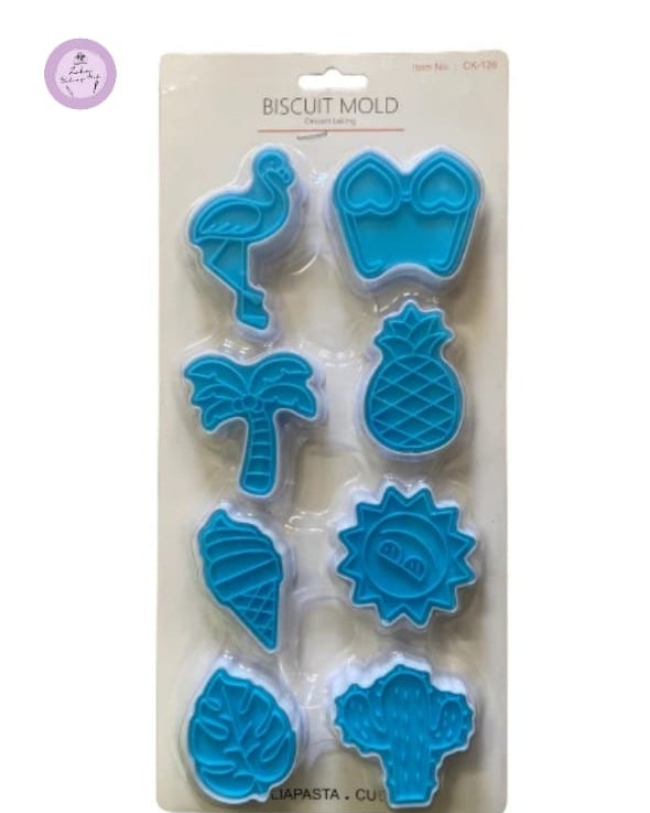Set of blue cookie cutters on a beige backing card