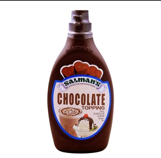Bottle of chocolate syrup with a label on a white background