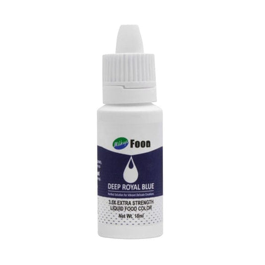 Bottle of deep royal blue liquid food color with a white cap on a white background.